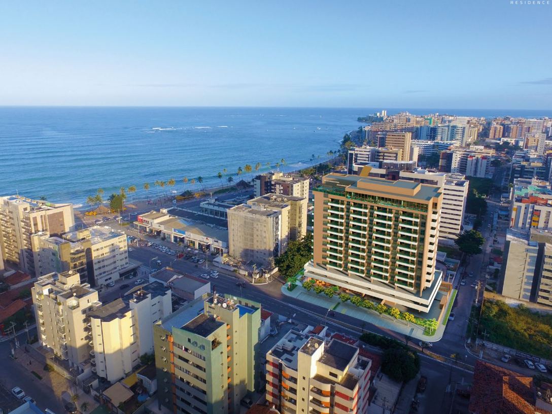 Vista aérea do Wish Residence com o mar da Ponta Verde ao fundo